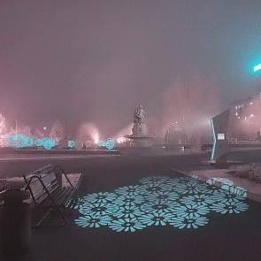 : night city in the fog